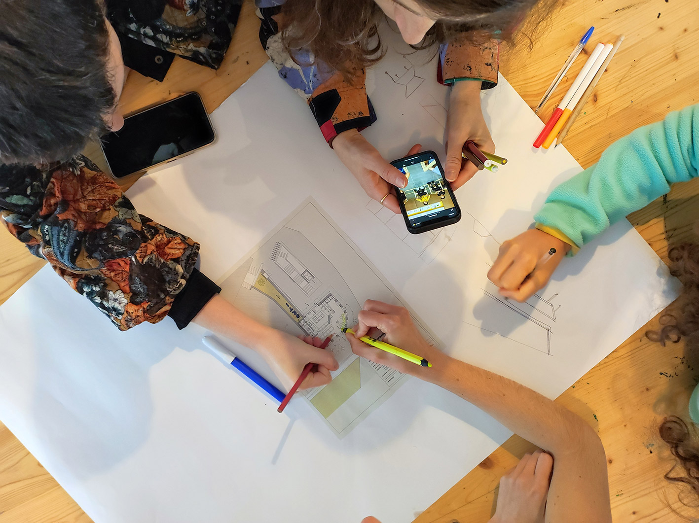 Workshop participants working on the spatial layout of the S4T Climate Canteen.
