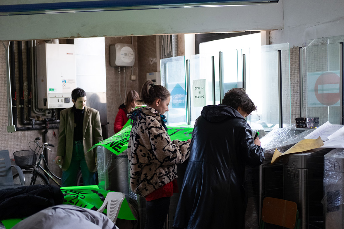 People writing and drawing their ideas inside the space that will become the S4T Biodiversity Kiosk.