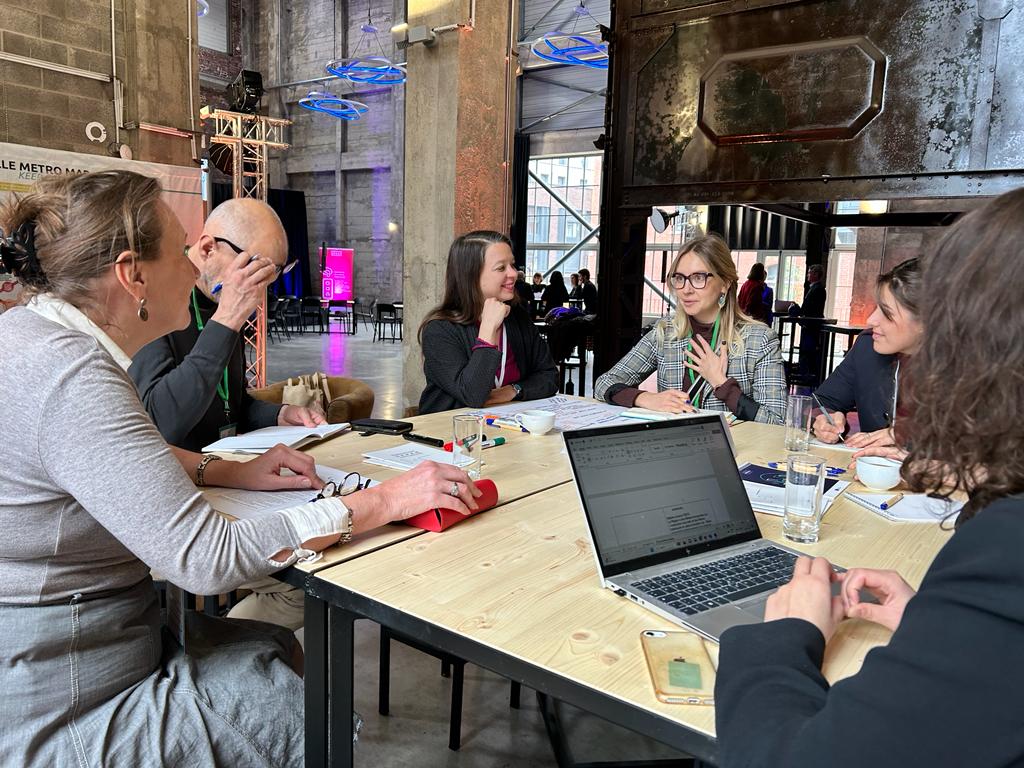 Group of people discussing projects