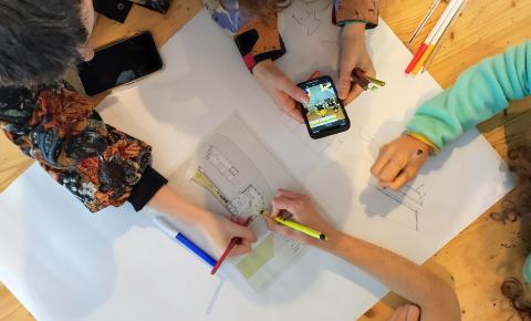 Workshop participants working on the spatial layout of the S4T Climate Canteen.