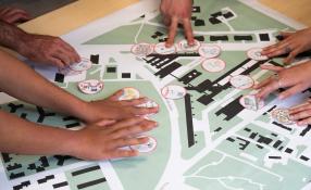 Picture of hands on a city map